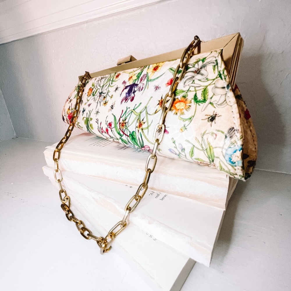 Gold and floral chain clutch handbag